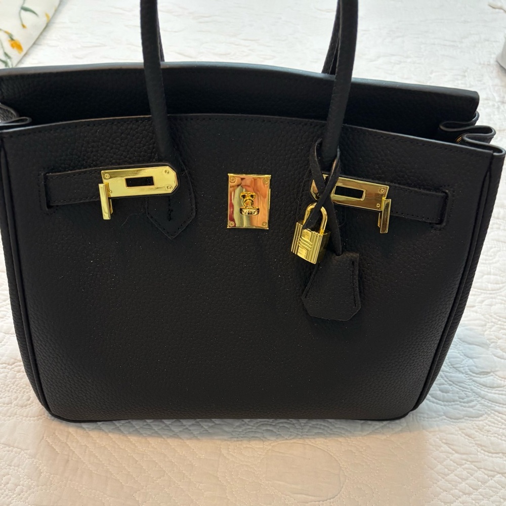 Chic Black Leather Satchel with Gold Accents